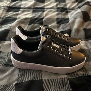Never worn Michael Kors tennis shoes